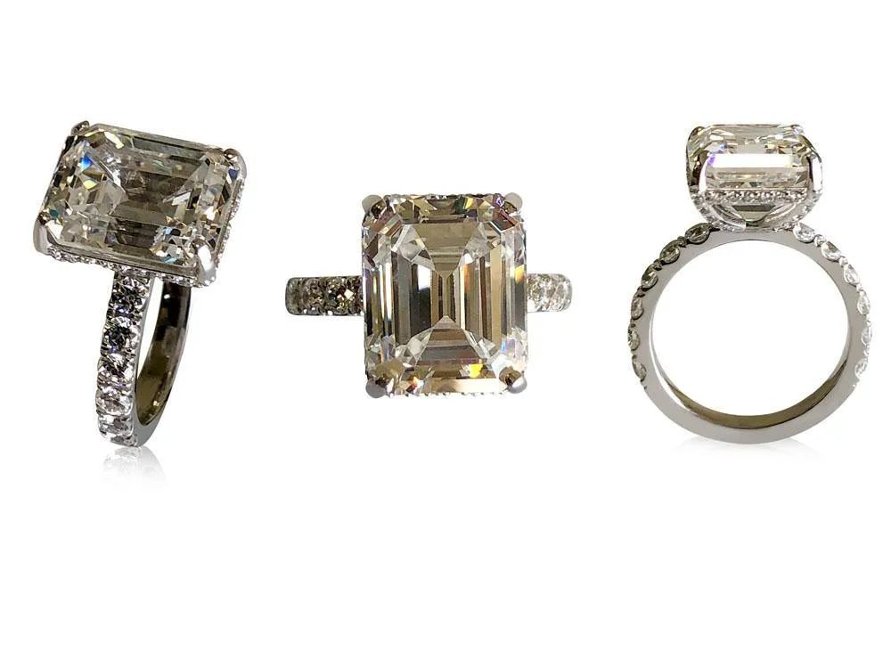 5 Carat Emerald cut 12 by 10 Cubic ZIrconia Engagement ring with pave halo 14K White gold