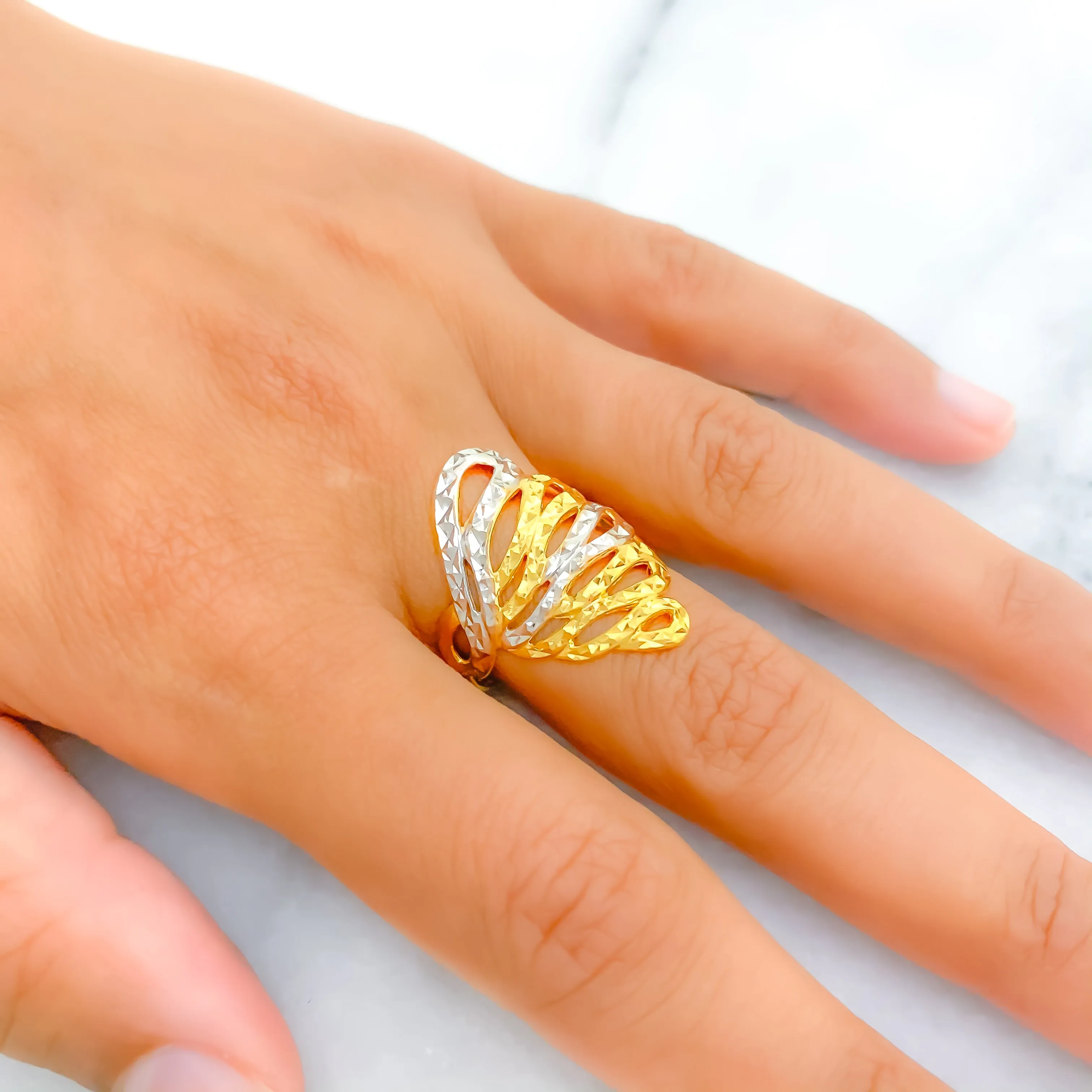 Asymmetrical Elongated Loop Ring