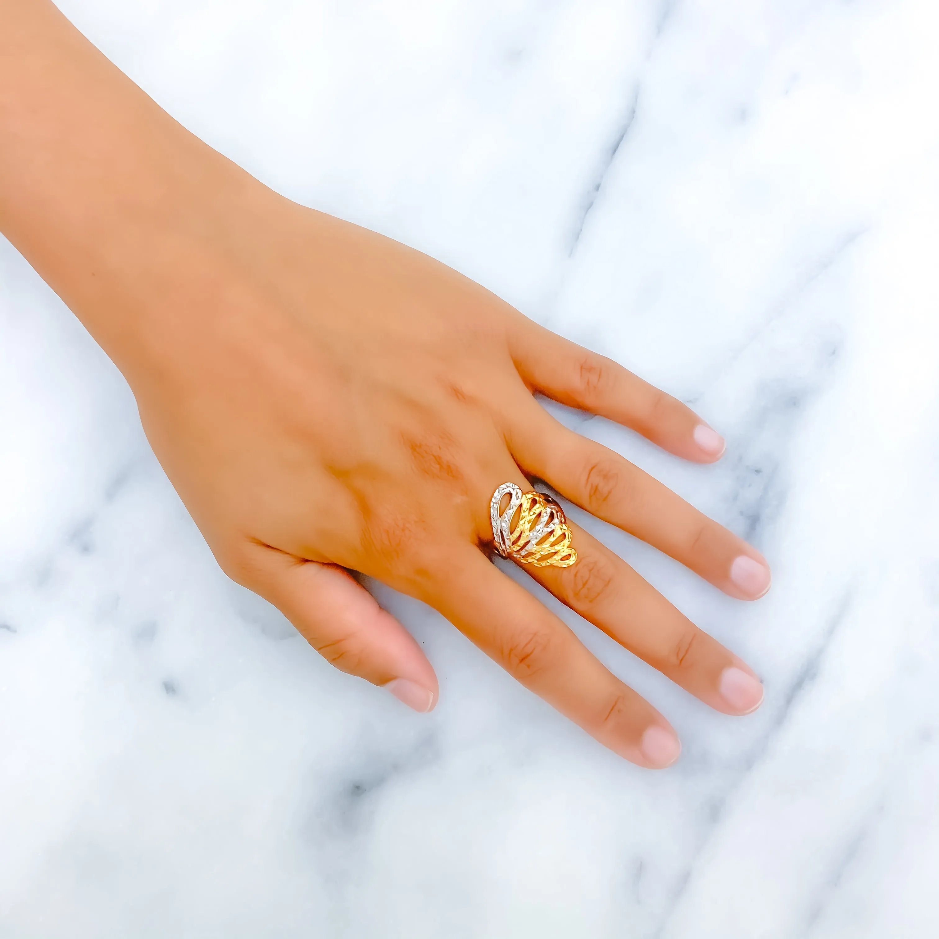 Asymmetrical Elongated Loop Ring