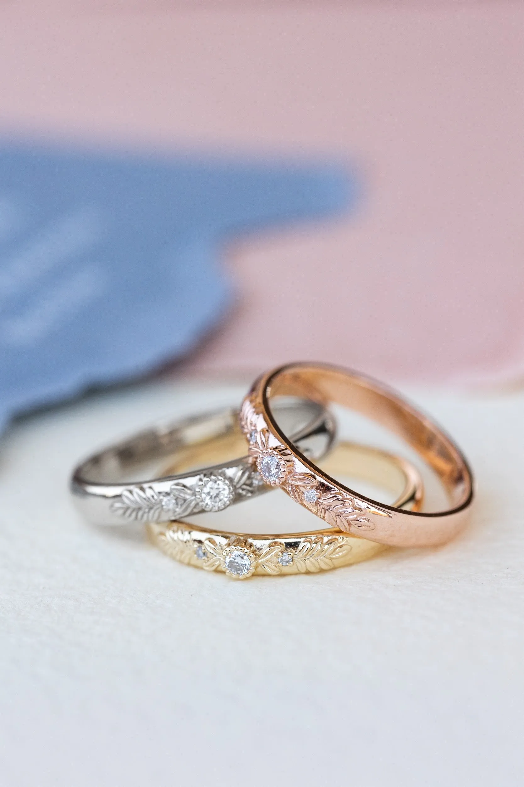 Wreath wedding band with three gemstones